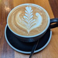 Flat white with oat milk at Metropole QVB in Sydney