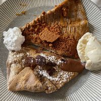 We had half the Lotus & half the Brownie one each! at Crêpeaffaire in Bromley