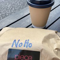 coffee cup and sandwich bag at Piece  in Glasgow