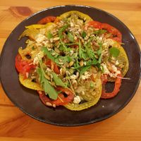 Tomato carpacchio with molecular kitchen bubbles filled with balsamic vinegar at Ventre Content in Liege