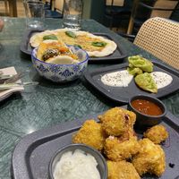 Gyosa , Pizza, cauliflower and another starter  at The Green Affair - Chiado in Lisbon