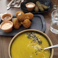 Entrees: Seasonal vegetable soup, spinach croquettes and cauliflower "wings". at The Green Affair - Chiado in Lisbon