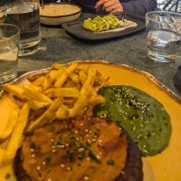 Seitan steak with pesto rosso, spinach purè and friend potato at The Green Affair - Chiado in Lisbon