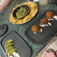 Vegan dumplings, vegan nachos and vegan arancini   at The Green Affair - Chiado in Lisbon