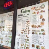 menu in the window at Enjoy Vegetarian - Financial District in San Francisco