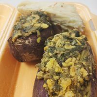 Sweet jacket potato, ackee and callaloo with yams.  at SoulFoods Farmacy in East London
