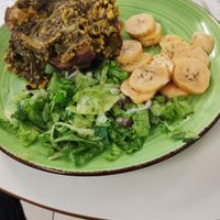 Baked sweet potato, ackee, callaloo, plantain and salad at SoulFoods Farmacy in East London