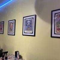 Tables full of cool stickers   at Crust and Crumble in Asbury Park