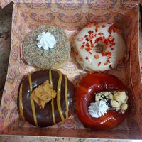 Plum Poppy Crumble, White Choc & Strawberries ,Chocolate Peanut Fudge, Cherry Pie 🍒 at Brammibal's Donuts - KaDeWe in Berlin