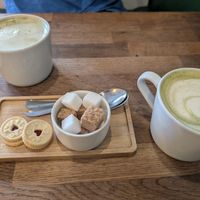 Matcha Latte - biscuits also vegan! at Mr Cooper's Coffee House in Whitby