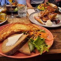 kimchi omlette (front), maple waffles and vegan scrambled egg at Palo Verde in Prague