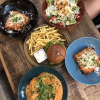 Basil tortellini, lasagna, burger, and Cesar salad   at Palo Verde in Prague