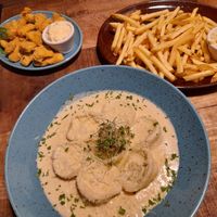 Mushroom tortellini in cream sauce, chickn nuggets, fries and mayo at Palo Verde in Prague