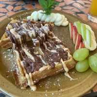 freshly made waffles with chocolate sauce  at Palo Verde in Prague