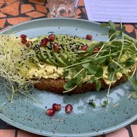 The bread is wonderful enriched with sumptuous spread topped with a generous amount of avocado. The greens and the pomegranate add harmony and a tempting appearance to the creation. Maybe the mustard is a bit overdosed.  at Palo Verde in Prague
