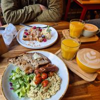 Scrambled tofu breakfast option, waffles, coffees and juice at Palo Verde in Prague