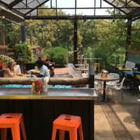 Outside seating at Hot Chip Burger Bar in Rochester