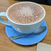 Hot chocolate with oat milk at Embrace Cafe in North London