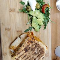 Parmigiana toasted sandwich, served with a small salad at Embrace Cafe in North London