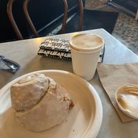 Cinnamon roll and cappuccino   at Terms of Endearment in Brooklyn