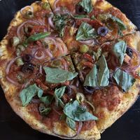 Create your own small pizza without cheese   at Minuteman Pizza in Uyuni