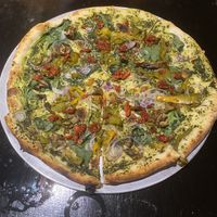 Pesto-based pizza, ask WITHOUT cheese   at Minuteman Pizza in Uyuni
