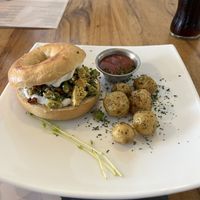 Tofu scramble bagel   at Karma in Jaco