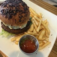 Mexi burger with fries   at Karma in Jaco