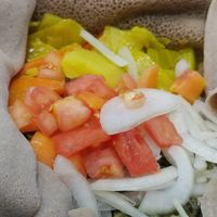 Wonderful bang for buck; their $9 Veggie Plate is easily lunch for two. The staff is friendly place that is a downtown favorite of Ethiopians. Feel free to ask for additional toppi at Habesha in Washington