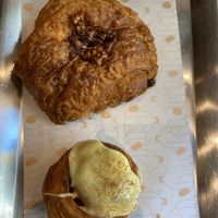 Pain au chocolate (top), cinnamon bun (bottom)  at Buddy Buddy in Brussels