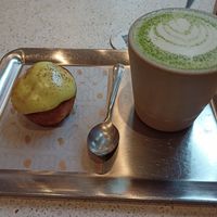 Matcha buddy and cinnamon roll at Buddy Buddy in Brussels
