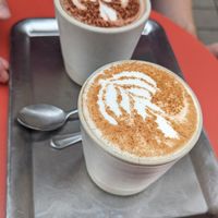 Special coffees - almond chai and a buttery chocolate option at Buddy Buddy in Brussels
