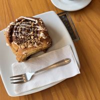 Cinnamon roll and cappucino  at Café Monteverde in Monteverde