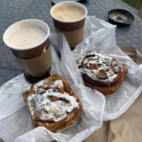 Vegan cinnamon buns (to go so topping got smushed), chai and cappuccino with almond milk.  at Café Monteverde in Monteverde