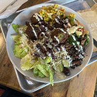 Create your own salad bowl with falafel, lentils, couscous, veggies, olives and grains. Comes with pita breadd  at Mezeh in Blacksburg