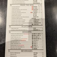 The 'V' in black circle on the order sheet indicates vegan at Din Tai Fung - Pine St in Seattle