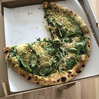 Vegan Verde: pesto, vegan cheese, oven baked tomatoes, cherry tomatoes, nuts, baby spinach and vegan grana padana cheese at Pixel in Solna