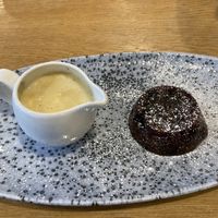 Vegan Christmas pudding with custard at Whins Kitchen in Wheelton