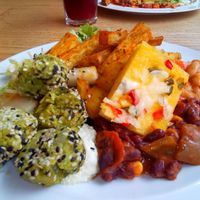 Green peas balls, corn based pizza, baked sweet potato at DaTerra - Parque das Nações in Lisbon