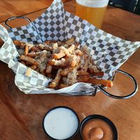Vegan garlic parmesan fries with vegan sauces  at The Point in Bend