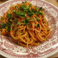 Pasta with tomato sauce and fresh herbs at Shari's Kitchen in Dusseldorf