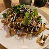 Scrambled tofu on toast with mixed veggies and sauces at Lion's Locker in Budapest