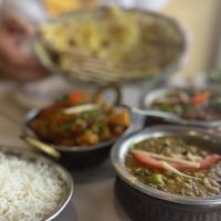 We loved the vegan chickpeas masala, the dal spinach, the seansonal vegetables and the vegan garlic naan with steamed rice.  at The Indian Hut in Chelsea