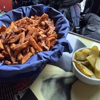 Side of pickles & basket of fries  at Blå Rock in Tromsoe