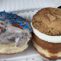 Cookie Monster donut and Oatmeal Cream Pie donut   at Crave Doughnuts in Whitby