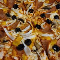 Brick oven pizza at Changomango in Merida