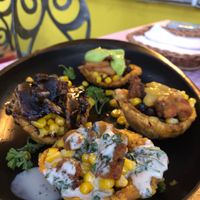 Patacones with different toppings at Casa Omedeto in Armenia