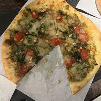 Ultraviolet pizza (one piece already eaten 🥰  at Virtuous Pie in Victoria