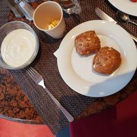 Left of the picture a bowl of soy yoghurt. at SORAT Hotel in Berlin