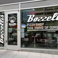 Outdoor seating with umbrellas outside.  at Bozzelli's in Washington